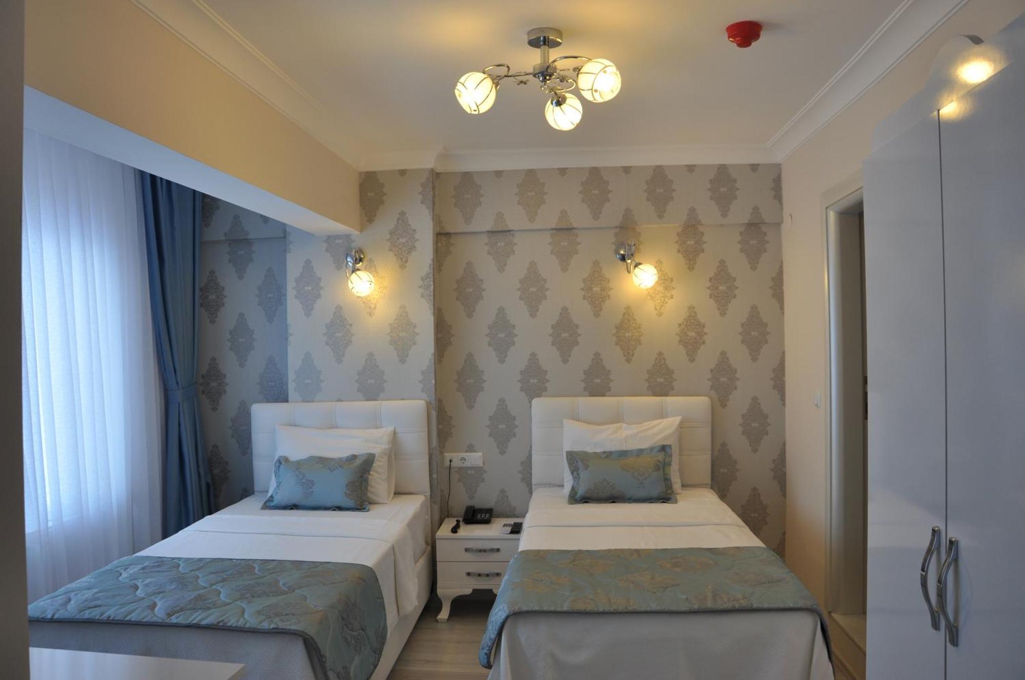 Hotel Iscen Mustafakemalpaşa Quarto foto